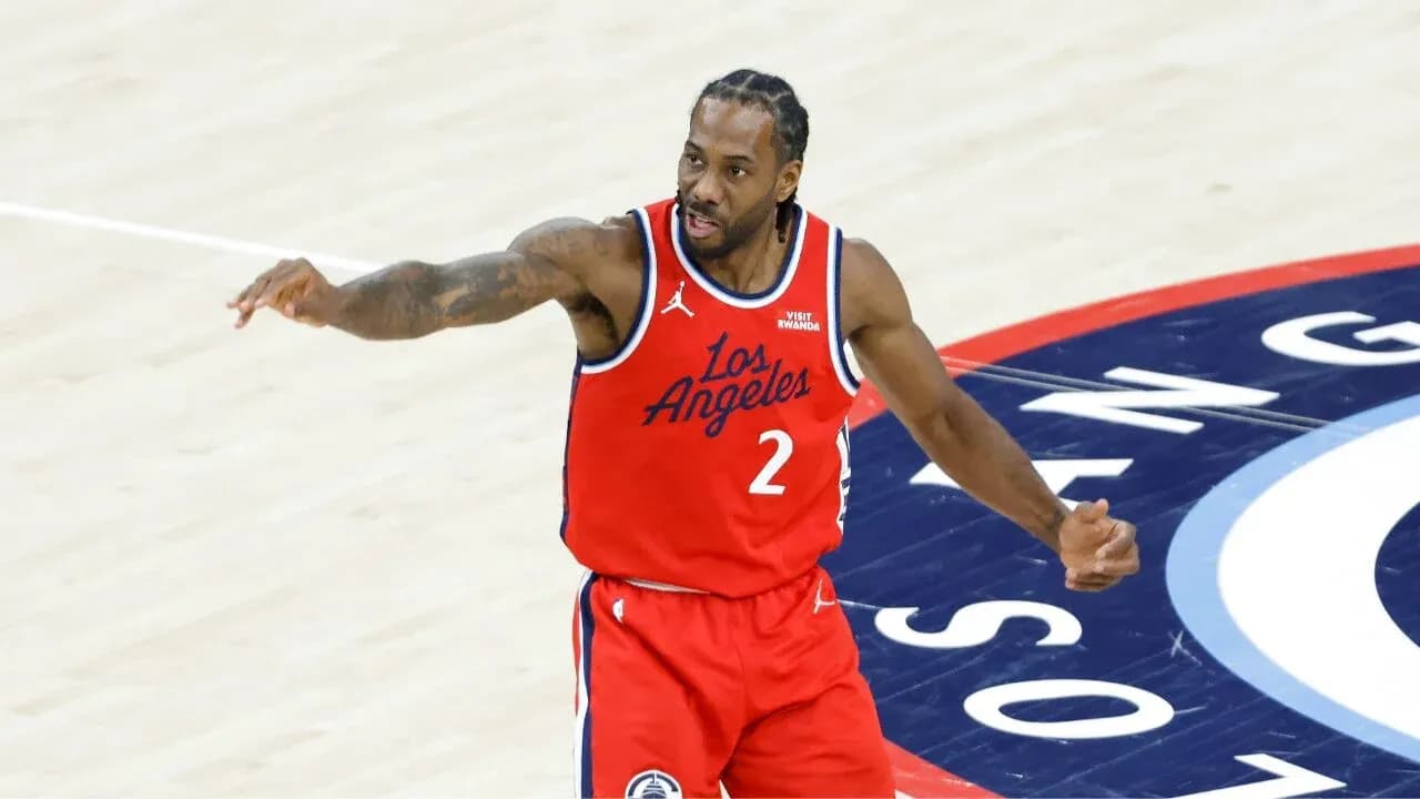 Basketball player signaling during a game