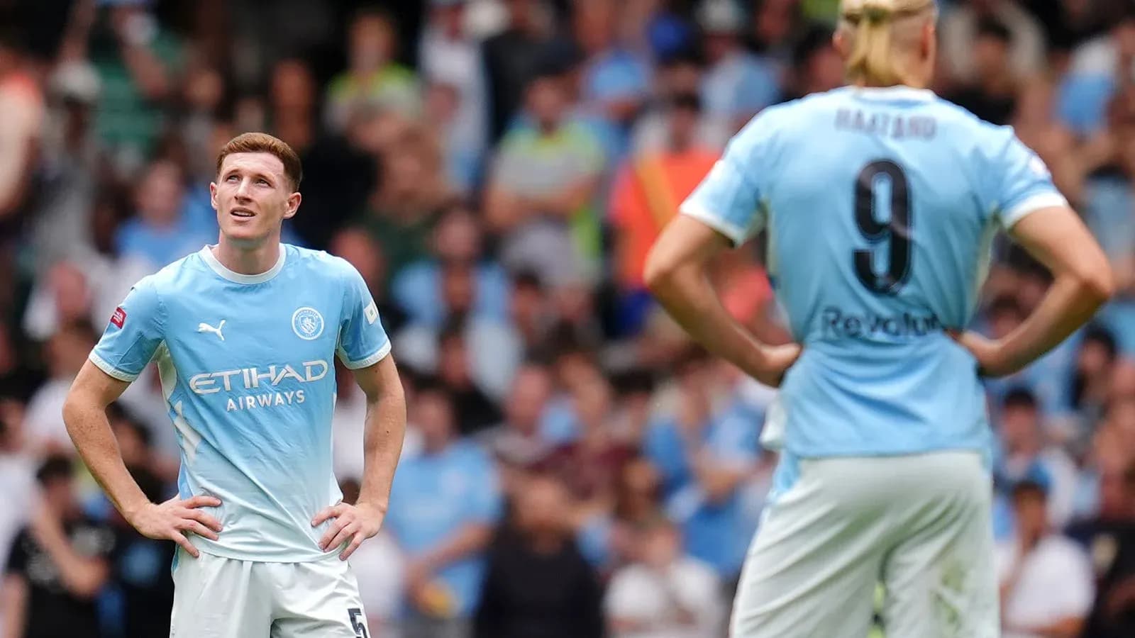 Manchester City players observing the game during match Manchester City players observing the game during match