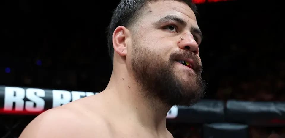 MMA fighter with mouthguard in ring