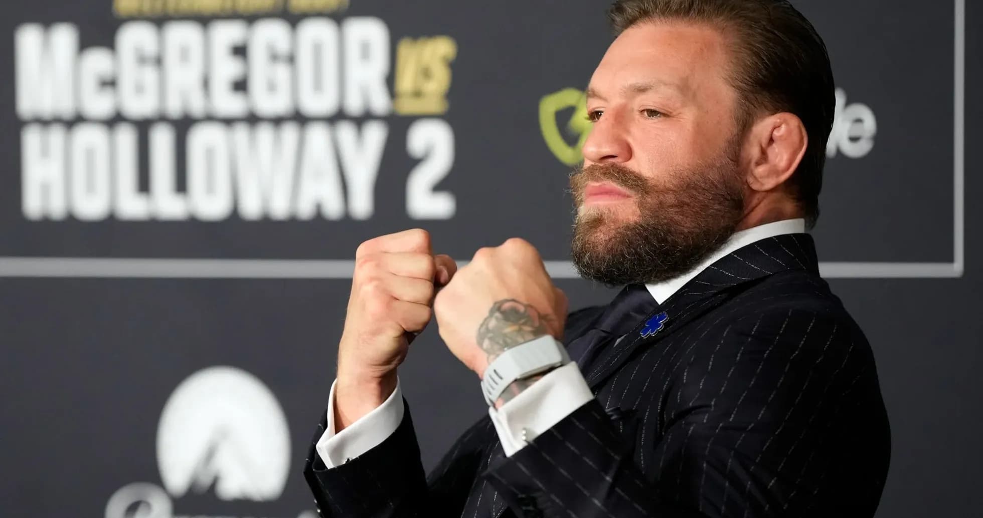 Conor McGregor posing at press conference for fight