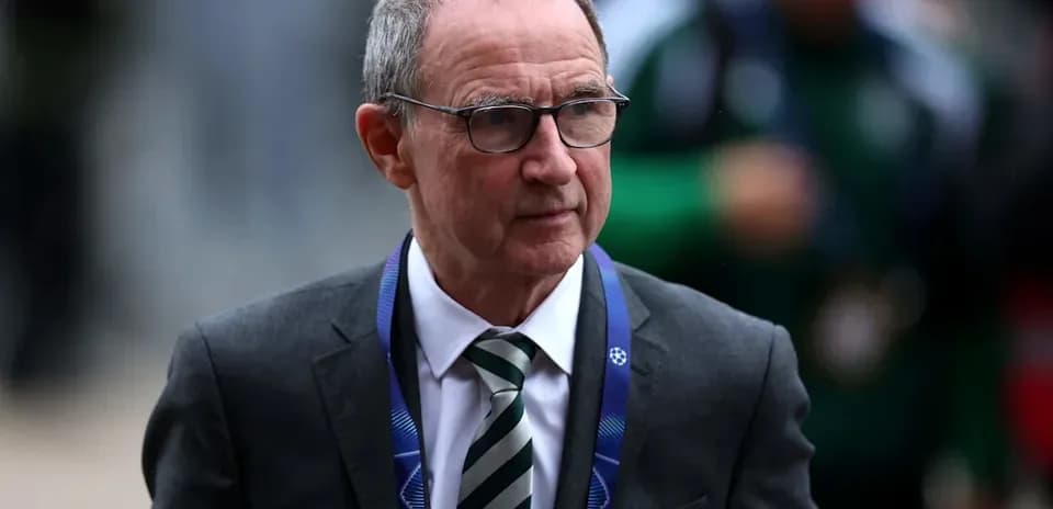 Men's football manager arriving at match venue