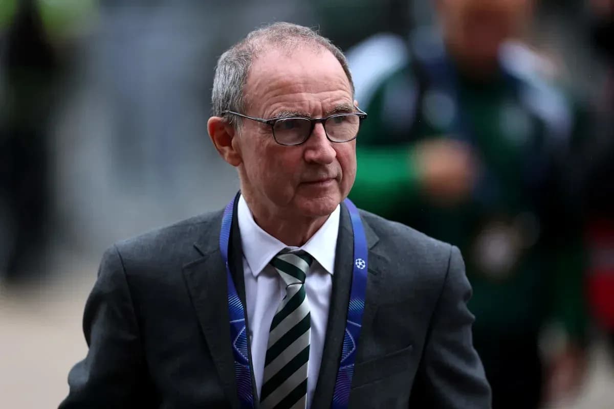 Men's football manager arriving at match venue