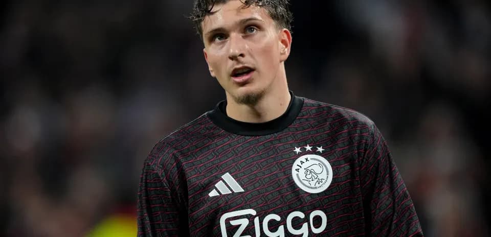 Ajax goalkeeper wearing black jersey during match