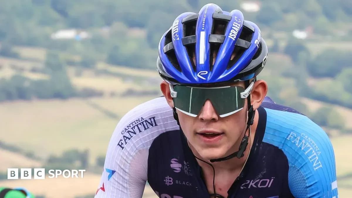 Professional cyclist competing in a race outdoors Professional cyclist competing in a race outdoors
