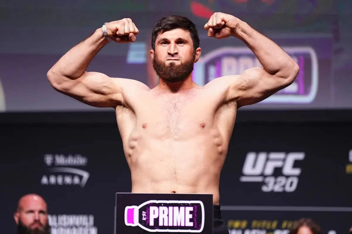 Brawler flexing muscles at UFC weigh-in event