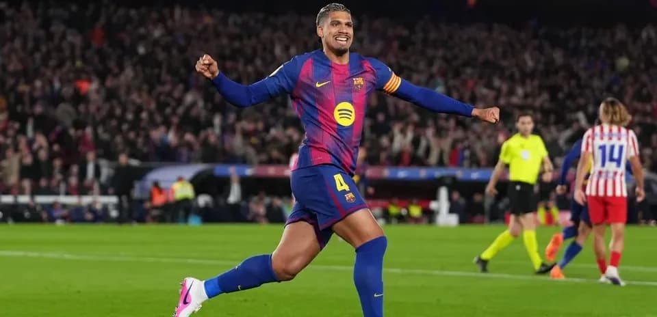 Barcelona player celebrating in front of crowd