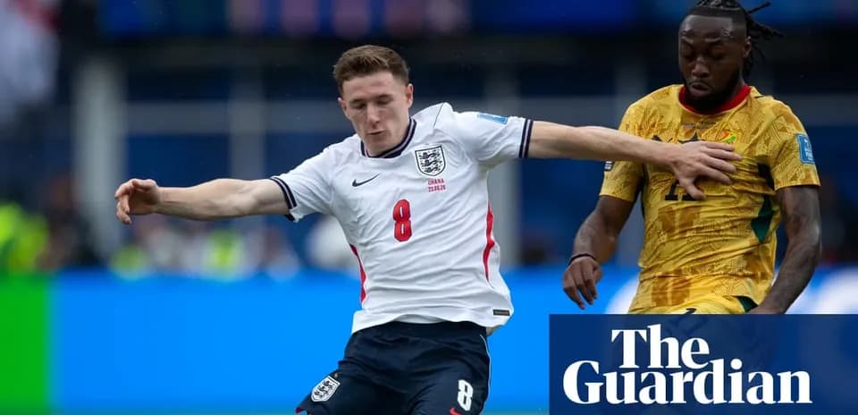 England player tackling Ghana opponent during match