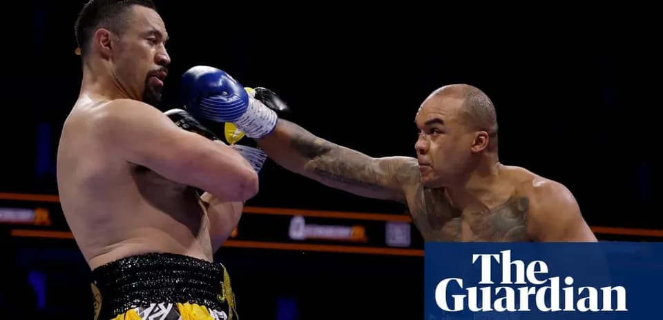 Boxers exchanging punches in the ring during match