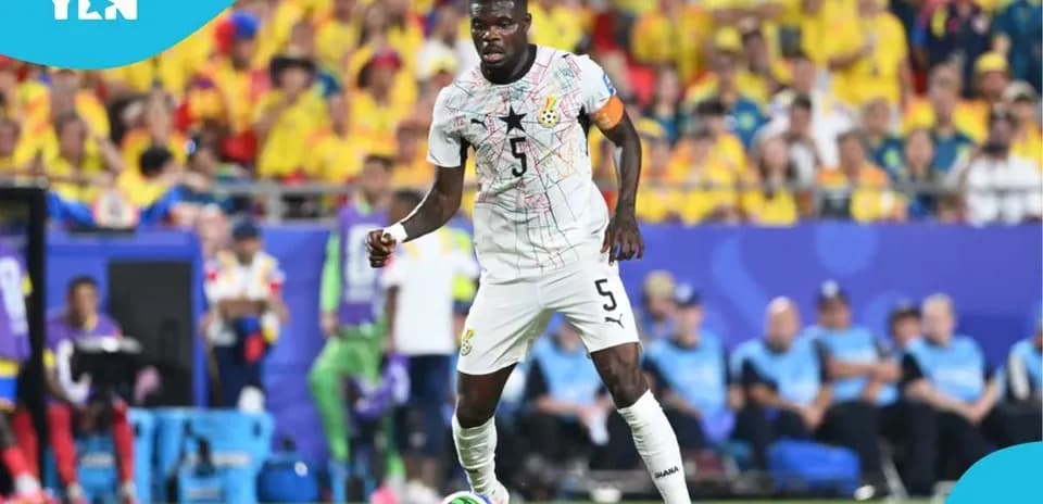 Ghana player dribbling the ball during a match