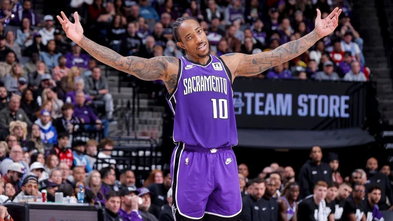 Basketball player gesturing to crowd during game
