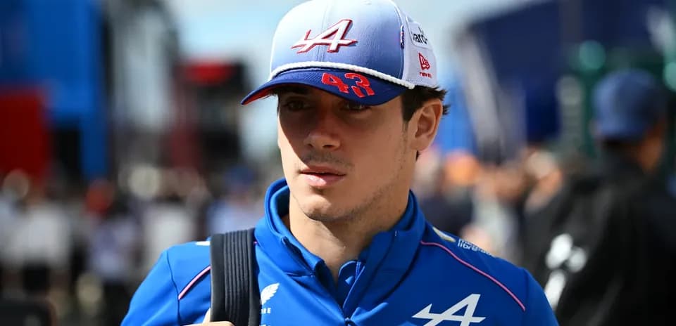Yoshimatz wearing Alpine team uniform and cap