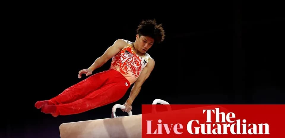 Gymnast performing on pommel horse during routine
