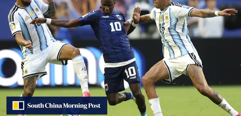 Three players contesting the ball during match