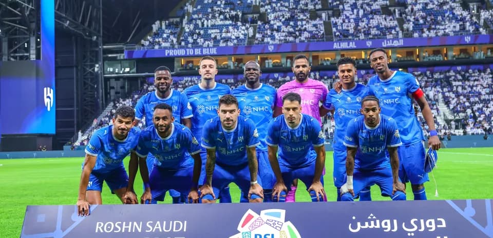 Al Hilal football team posing for group photo