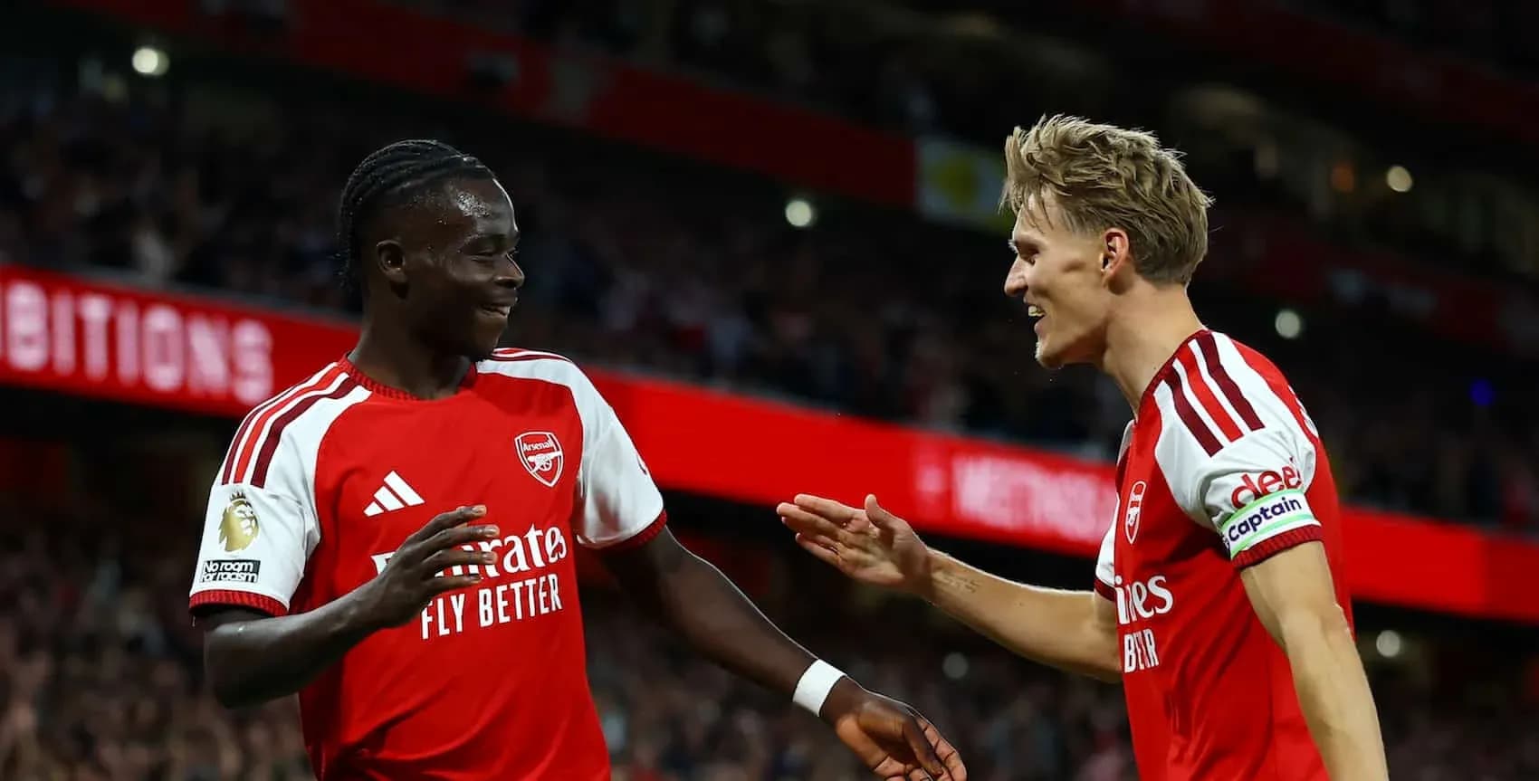 Arsenal players celebrating a goal during match