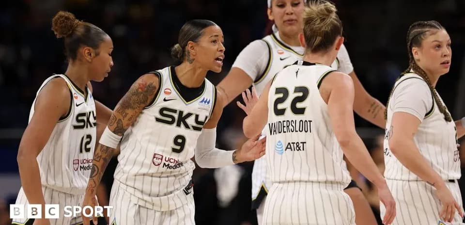 Chicago Sky players discussing during a game