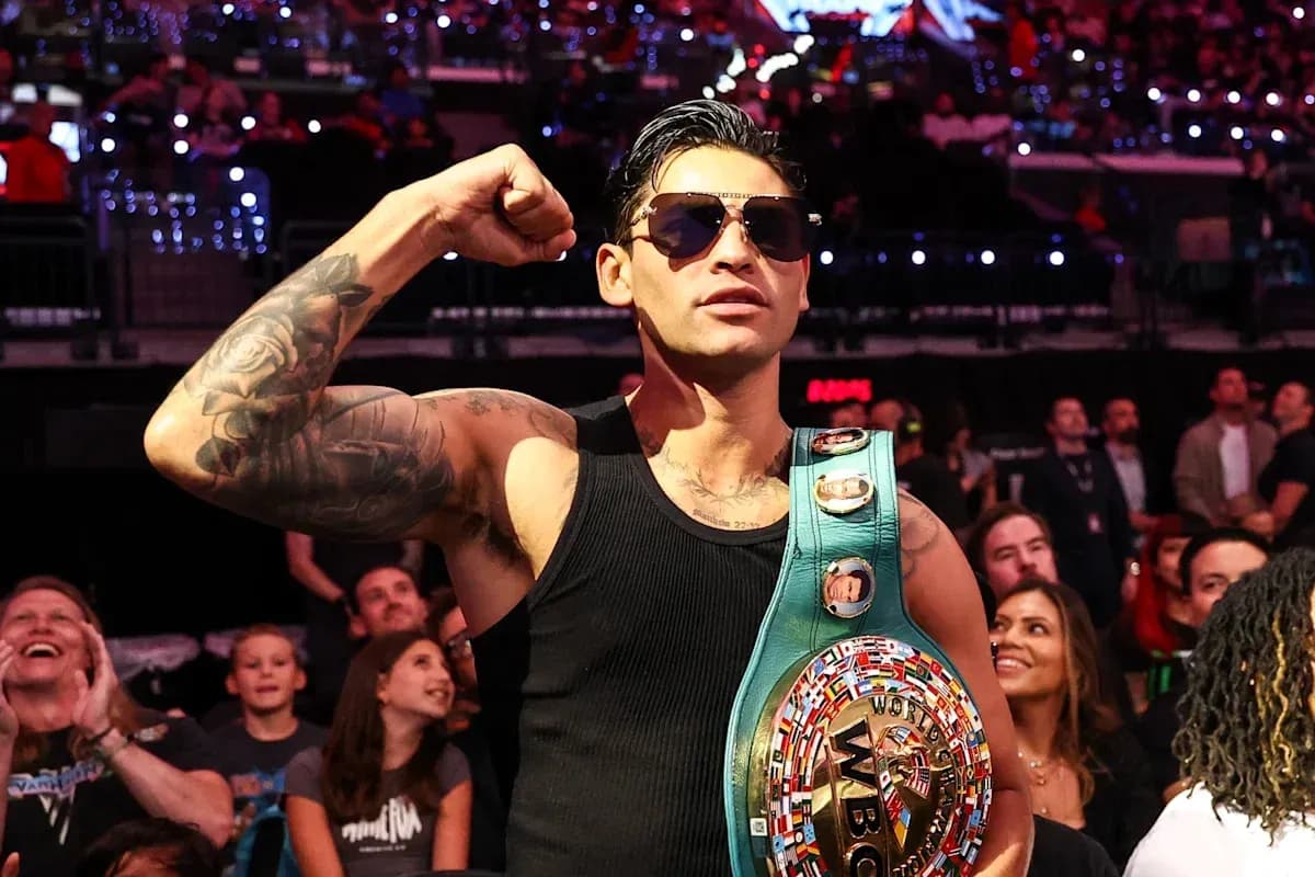B boxer celebrating with championship belt in crowd