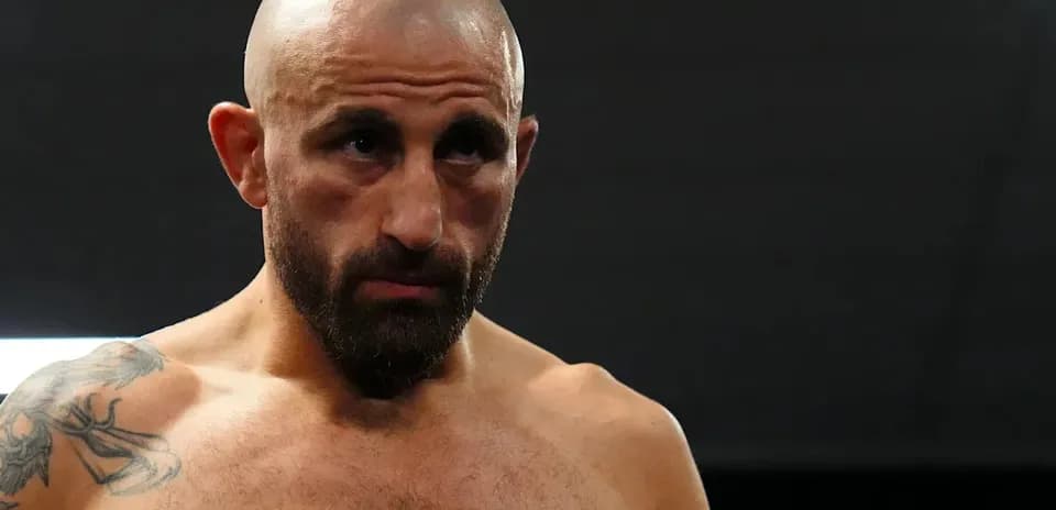 Bald fighter preparing before a match