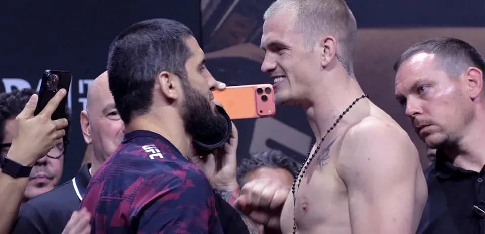 Two fighters facing off at weigh-in event
