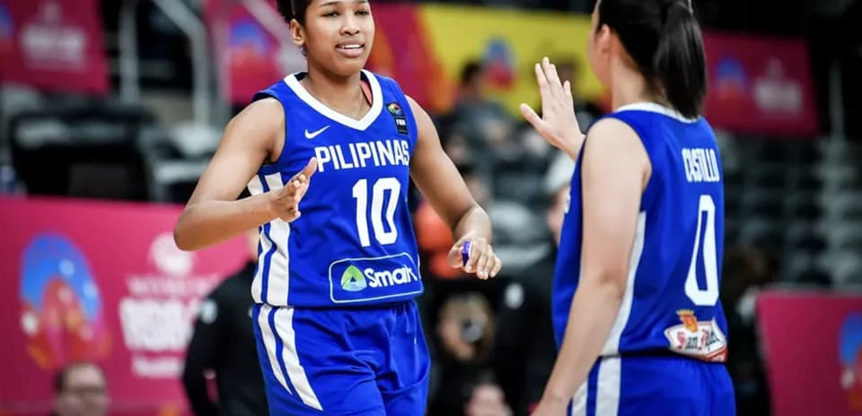 Duo of players celebrating during basketball match