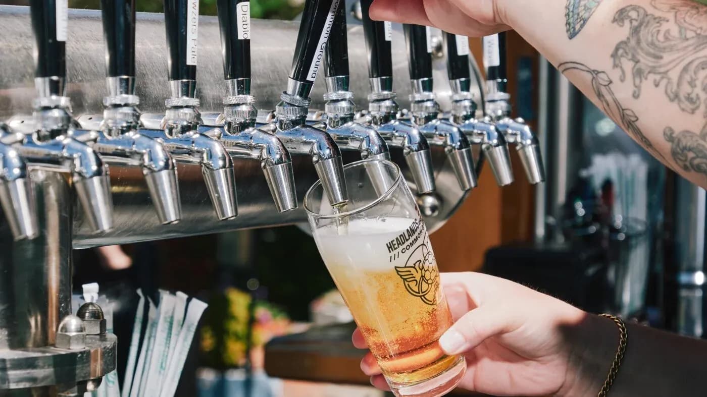Pint being filled from a beer tap