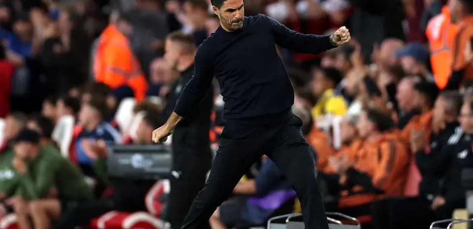 Mikél Arteta celebrating on the sidelines during match