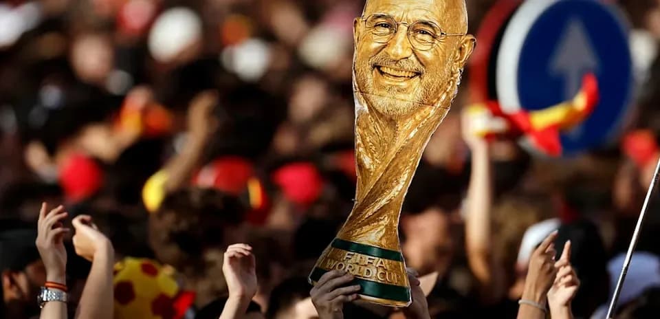Fans celebrating with a trophy in crowd