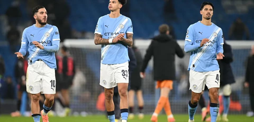 Manchester City players leaving the pitch after match