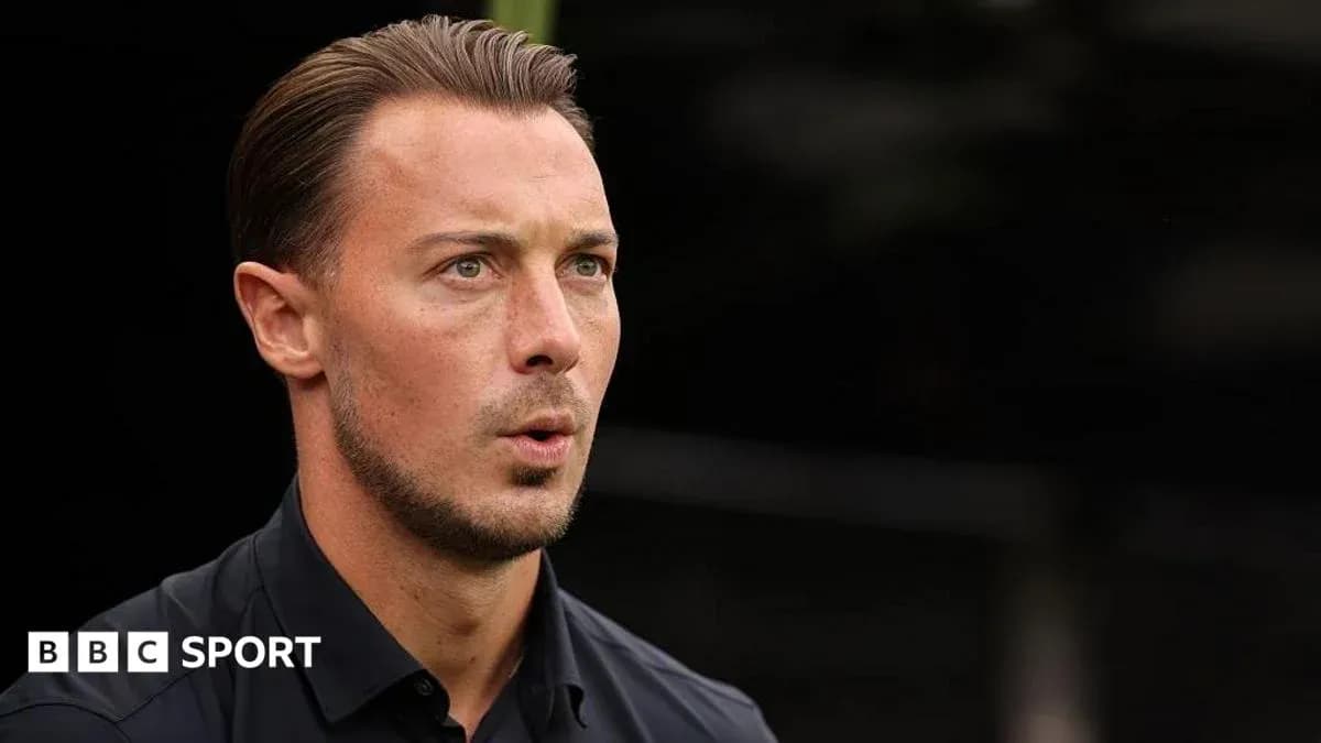 Football manager speaking during press conference