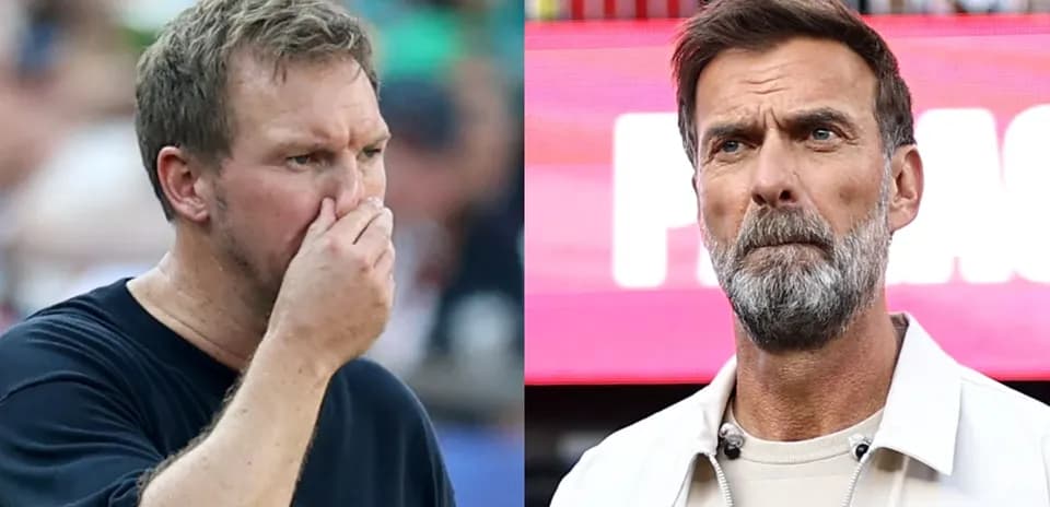 Two coaches observing the game from sidelines