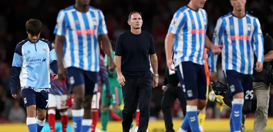 Huddersfield Town players walking off the pitch
