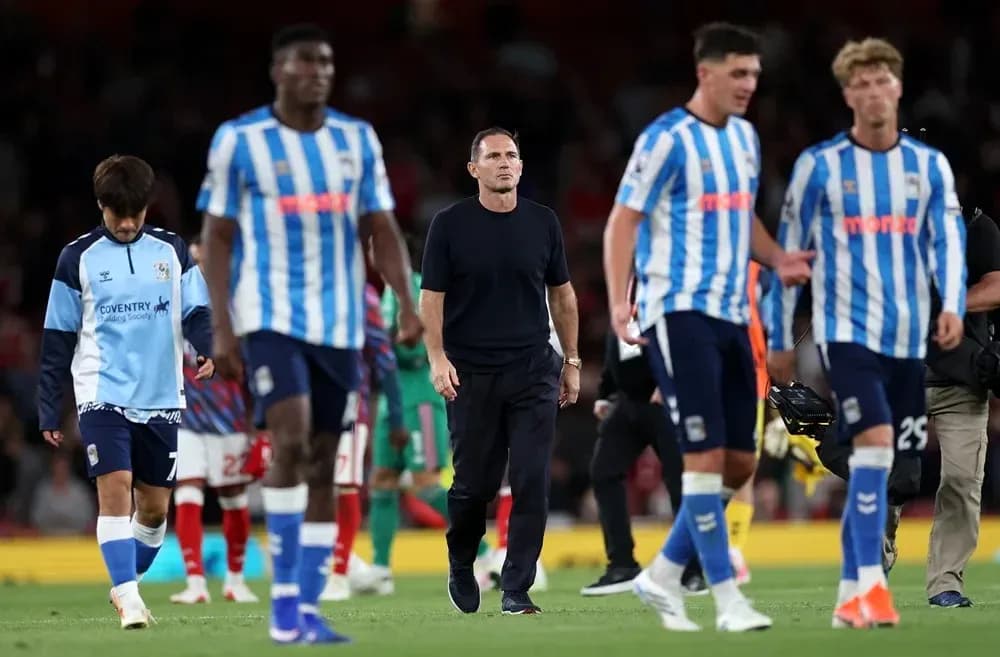 Huddersfield Town players walking off the pitch
