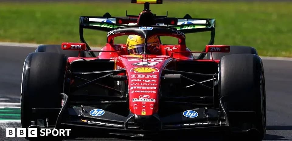 Formula 1 car racing on track with driver