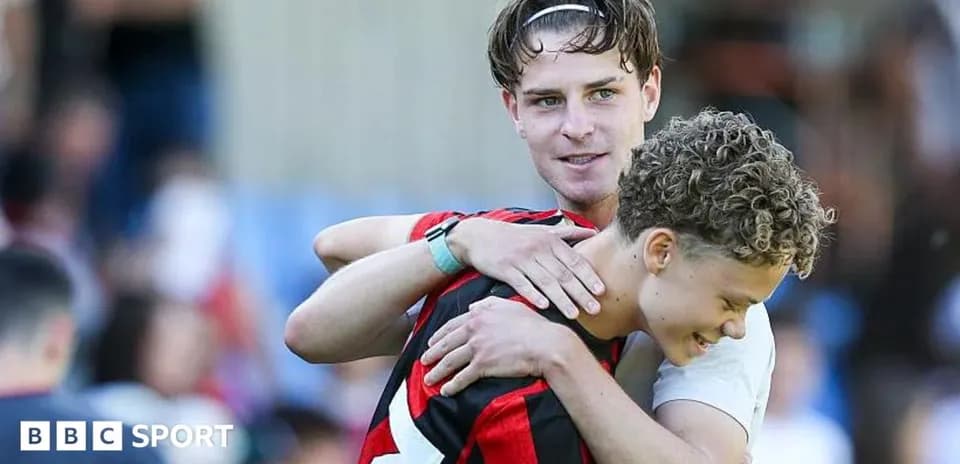 Two players embracing after a match