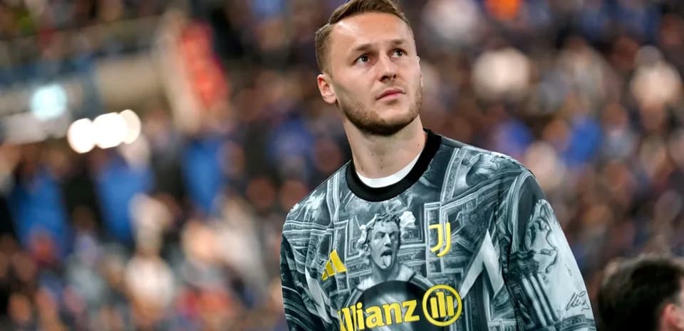Goalkeeper in Juventus kit looking towards the crowd