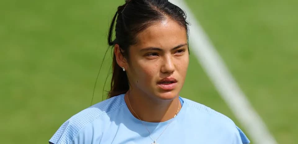 Athlete in blue training shirt on field