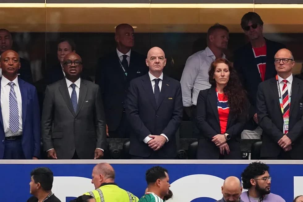 Officials watching the match from VIP box