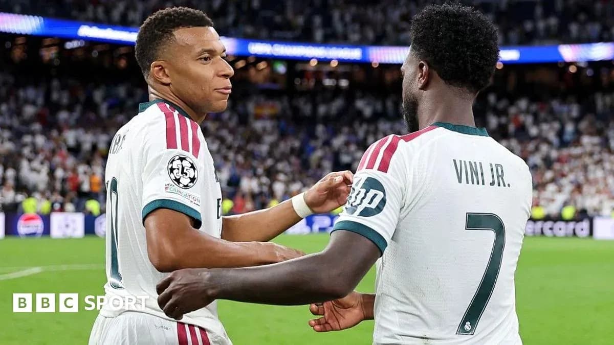 Mbappé and Vini Jr. celebrating on the field