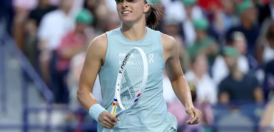Tennis player celebrating during a match at stadium