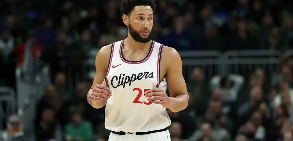 Basketball player in Clippers uniform on court