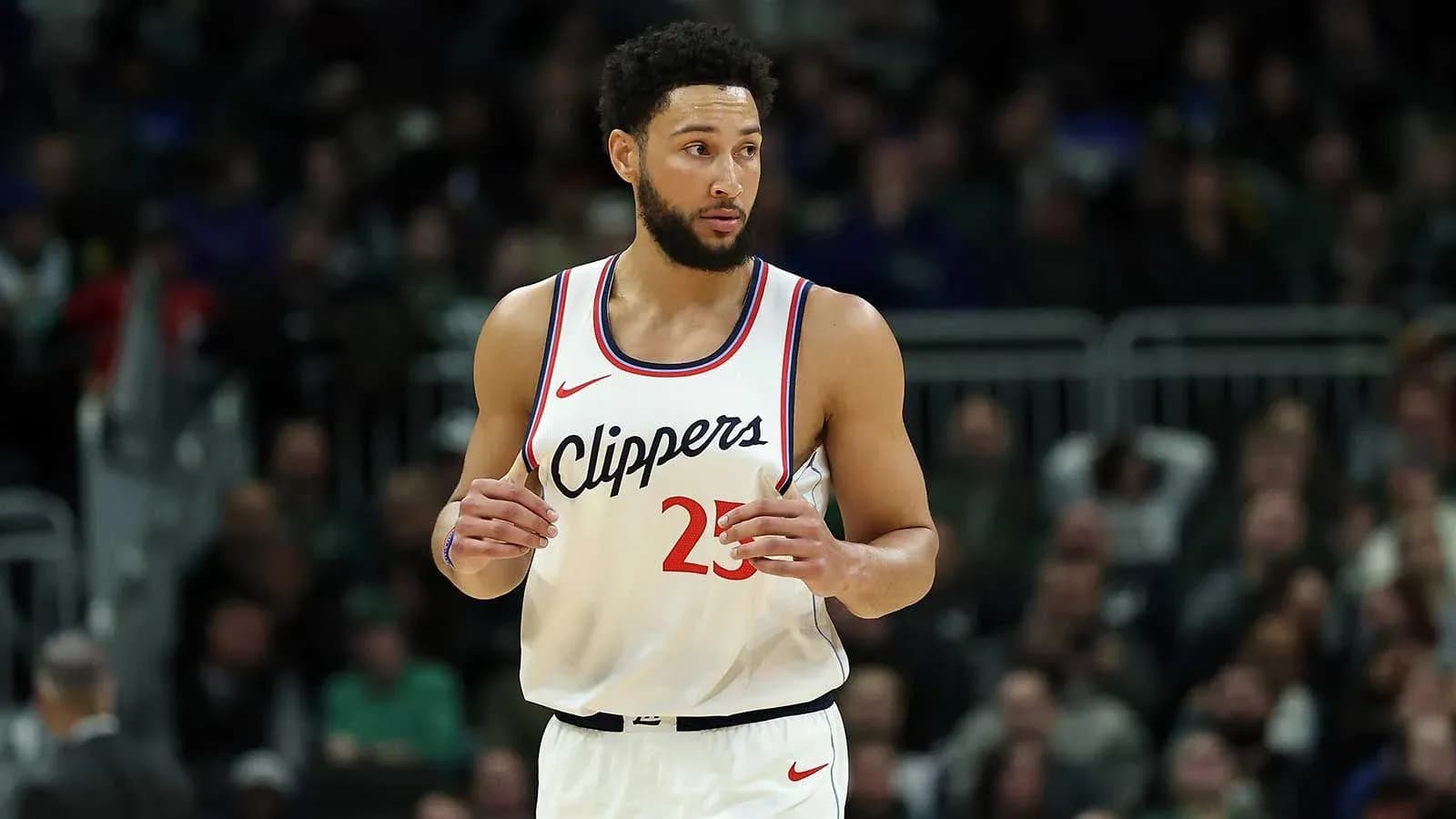 Basketball player in Clippers uniform on court