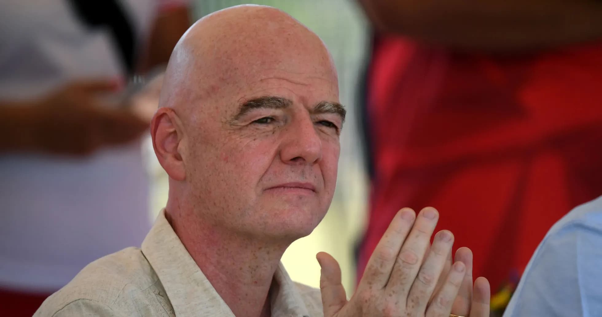 Man clapping at an outdoor event