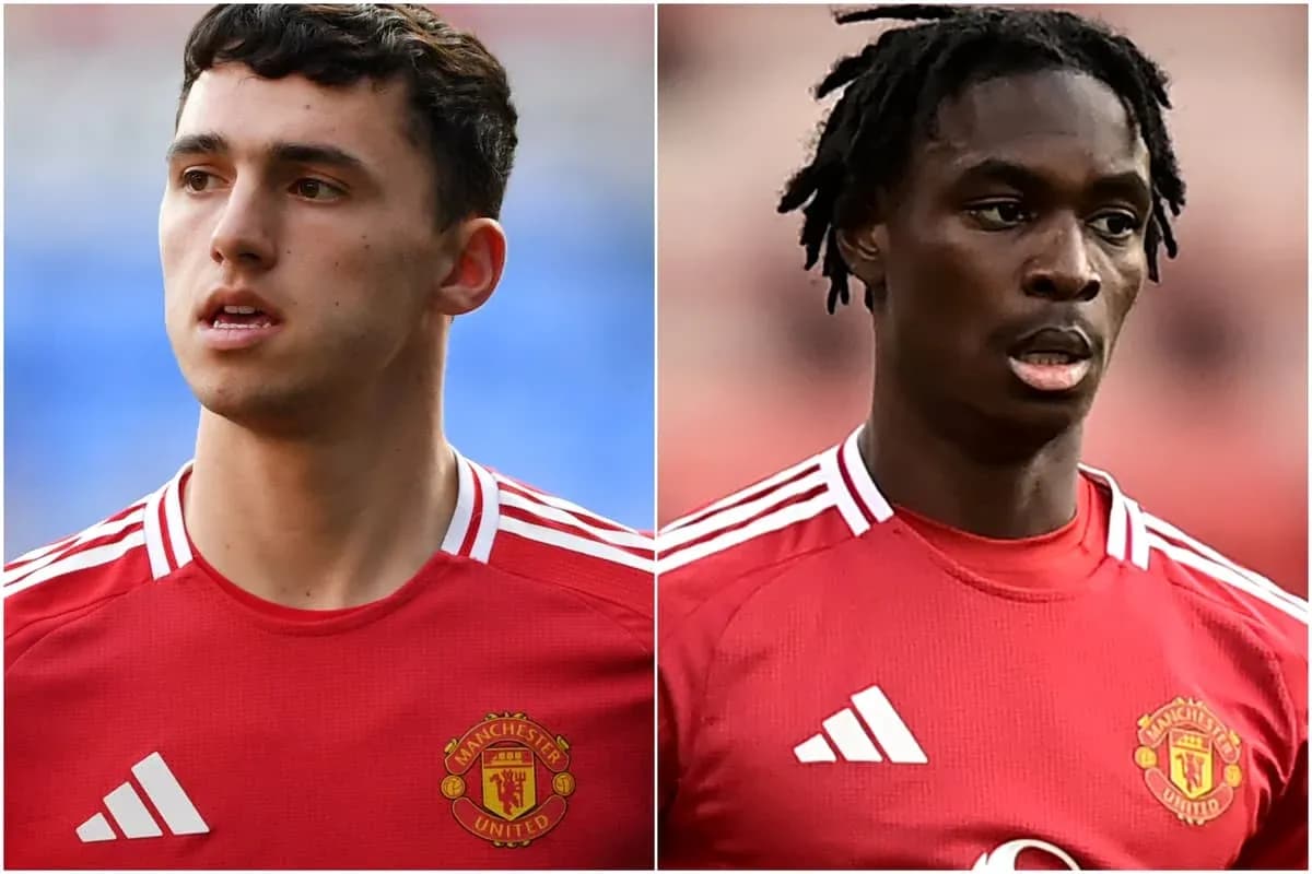 Two Manchester United players in red jerseys