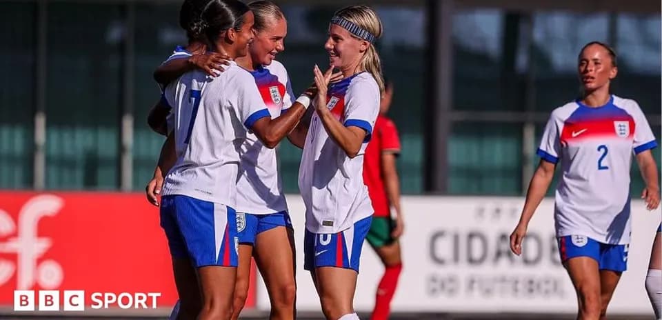 England players celebrating a goal during match