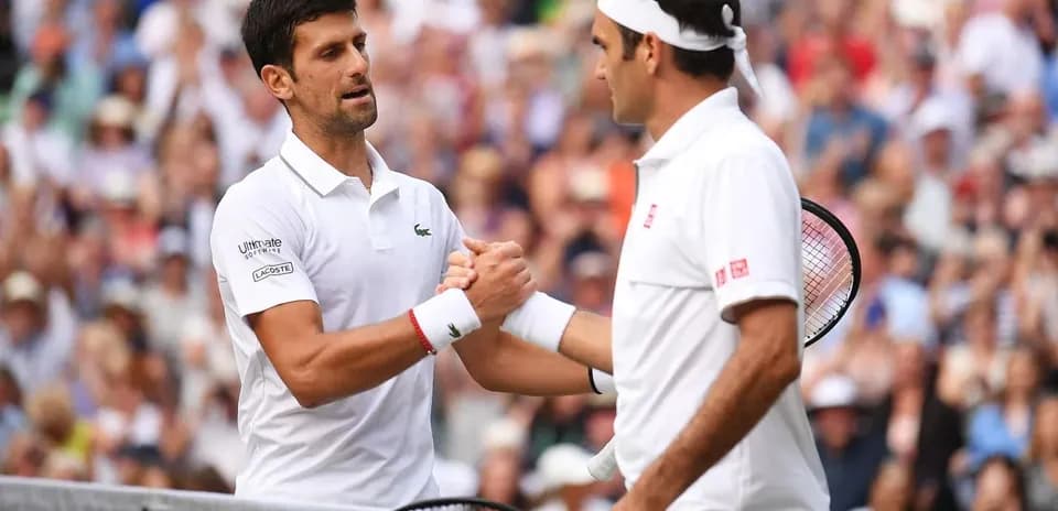 Novak Djokovic and Roger Federer shaking hands after match