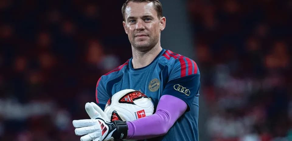 Goalkeeper holding ball during training session