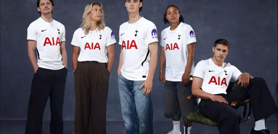 Five models wearing Tottenham Hotspur jerseys