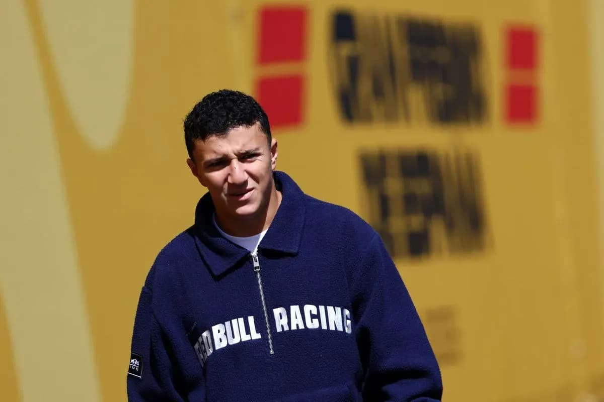 Young man in Red Bull Racing jacket outdoors