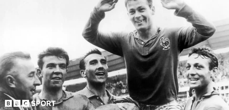 Football players celebrating victory after match