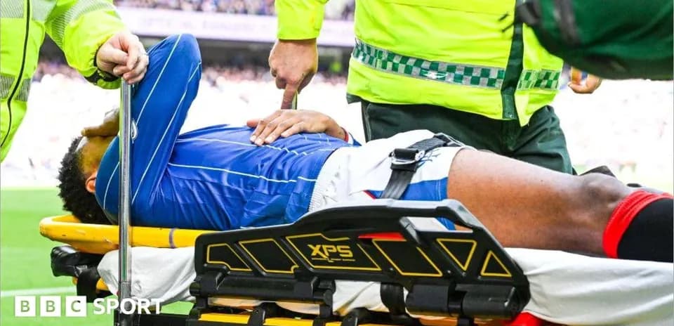 Player being stretchered off by medical personnel